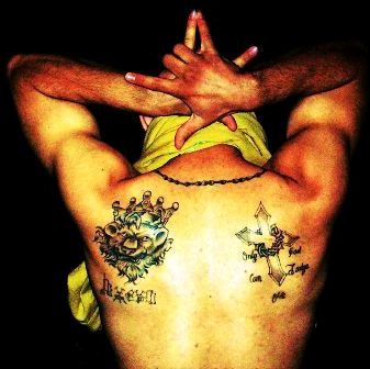 Latin Kings gang member showing his gang tattoo